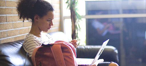 Girl on laptop.
